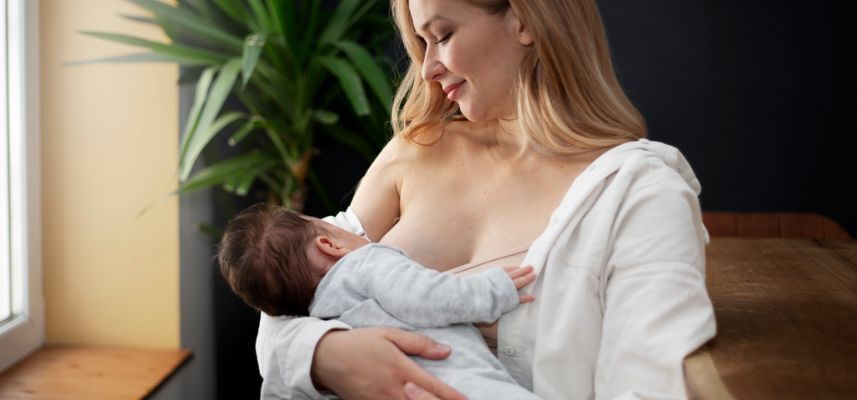 mom breastfeeding baby